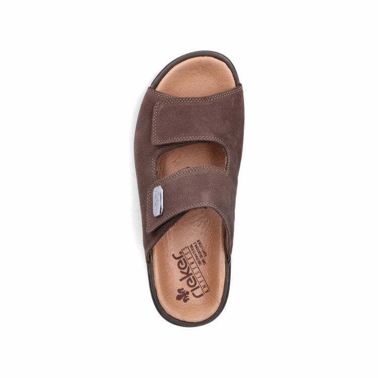 Mules marron pour homme de la marque Rieker. Référence 25590-25 Moro. Disponible chez Chauss'Family magasin de chaussures à Issoire.