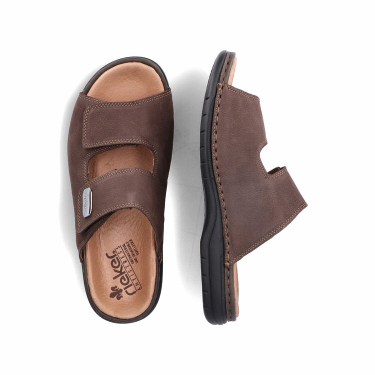 Mules marron pour homme de la marque Rieker. Référence 25590-25 Moro. Disponible chez Chauss'Family magasin de chaussures à Issoire.