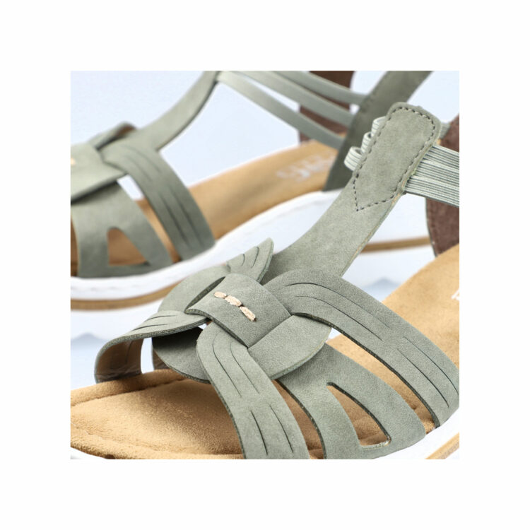 Sandales compensées pour femme de la marque Rieker. Référence : 67459-52 Schilf. Disponible chez Chauss'Family magasin de chaussures à Issoire.
