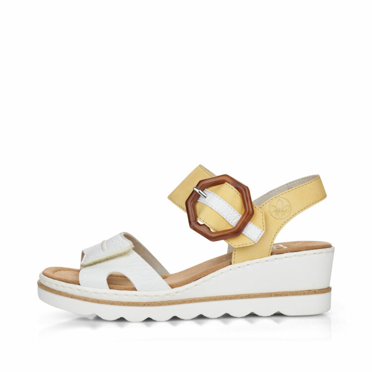 Sandales compensées pour femme de la marque Rieker. Référence : 67476-52 Weiss Sun. Disponible chez Chauss'Family magasin de chaussures à Issoire.