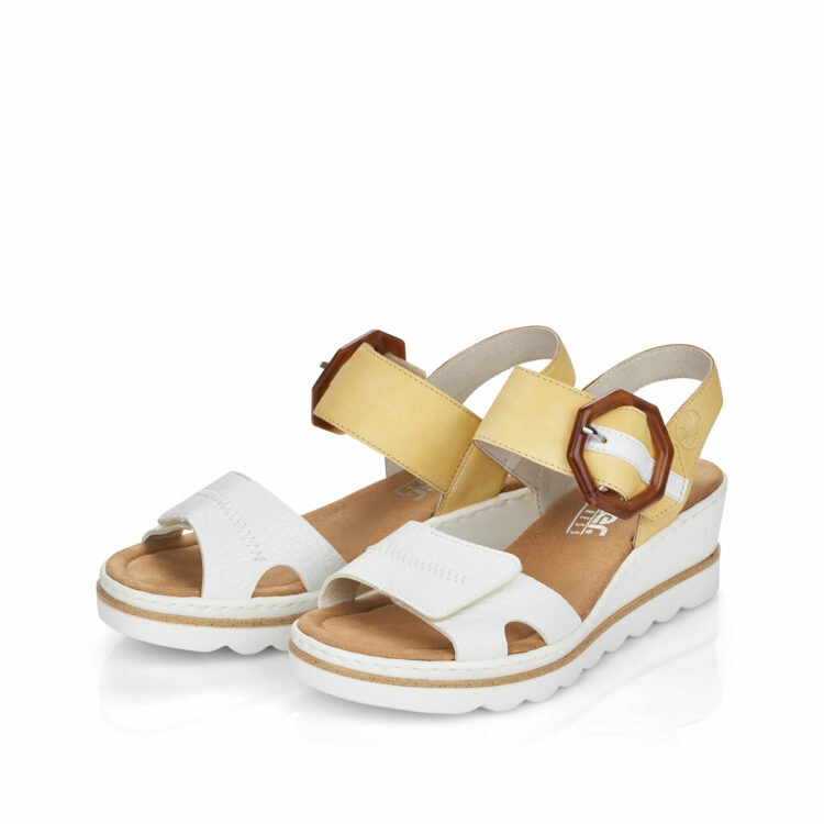 Sandales compensées pour femme de la marque Rieker. Référence : 67476-52 Weiss Sun. Disponible chez Chauss'Family magasin de chaussures à Issoire.