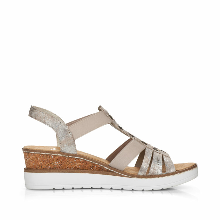 Sandales compensées pour femme de la marque Rieker. Référence : V3822-90 Rose metallic. Disponible chez Chauss'Family magasin de chaussures à Issoire.