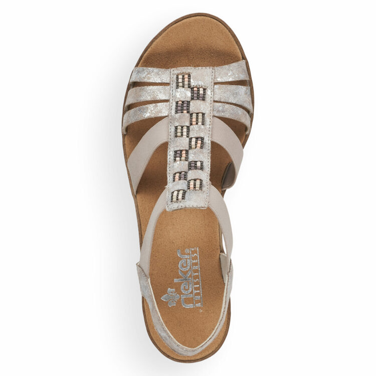 Sandales compensées pour femme de la marque Rieker. Référence : V3822-90 Rose metallic. Disponible chez Chauss'Family magasin de chaussures à Issoire.