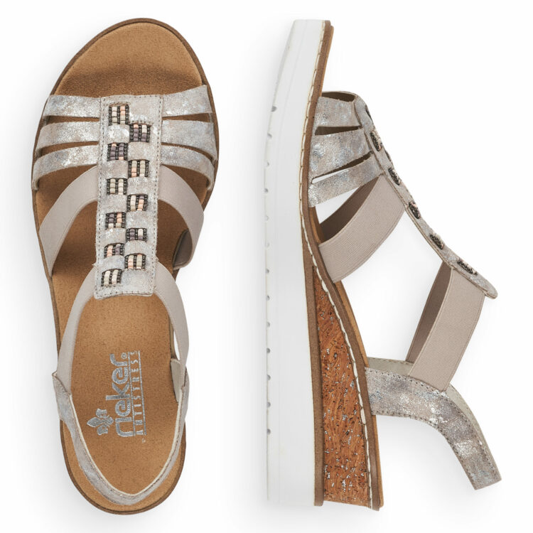 Sandales compensées pour femme de la marque Rieker. Référence : V3822-90 Rose metallic. Disponible chez Chauss'Family magasin de chaussures à Issoire.