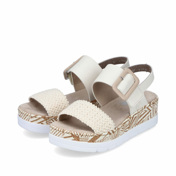 Sandales compensées pour femme de la marque Rieker. Référence : V3950-61 Creme. Disponible chez Chauss'Family magasin de chaussures à Issoire.