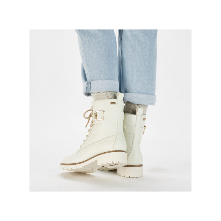 Bottines blanches chaudes pour femme marque Rieker. Référence Y9126-80 Dirty White. Disponible chez Chauss'Family magasin de chaussures Issoire.