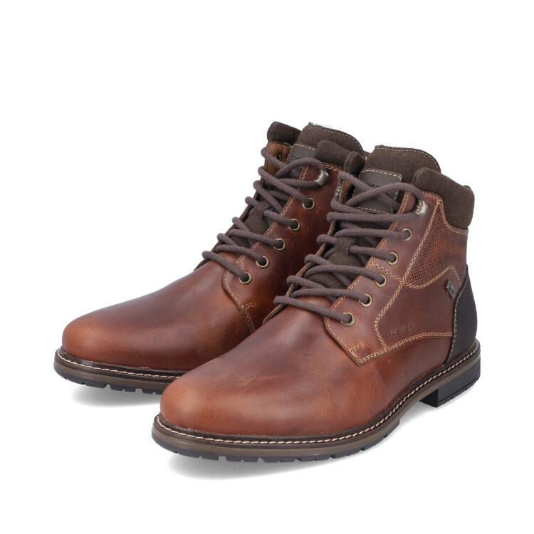 Bottines chaudes pour homme marque Rieker. Référence 13740-24 Braun. Disponible chez Chauss'Family magasin de chaussures Issoire.