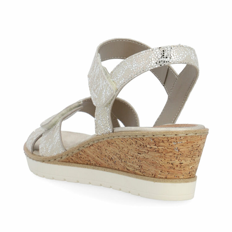 Sandales argentées compensées pour femme de la marque Remonte. Référence : R6252-91 Weiss-gold. Disponible chez Chauss'Family magasin de chaussures à Issoire.