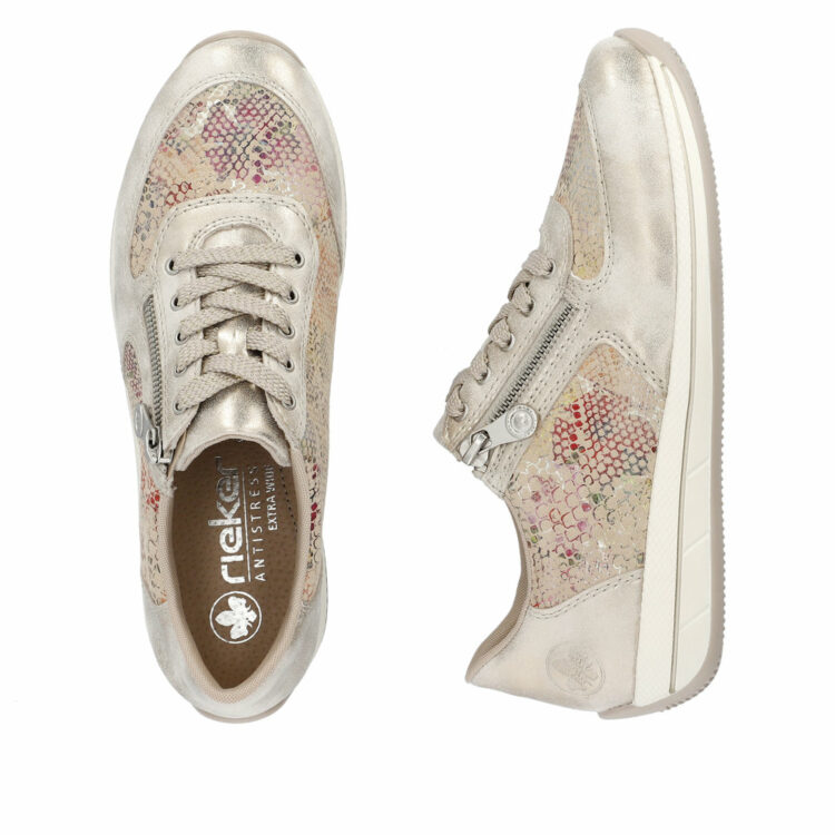 Baskets dorées à fleurs pour femme marque Rieker. Référence N1112-91 Muschel. Disponible chez Chauss'Family magasin de chaussures à Issoire.