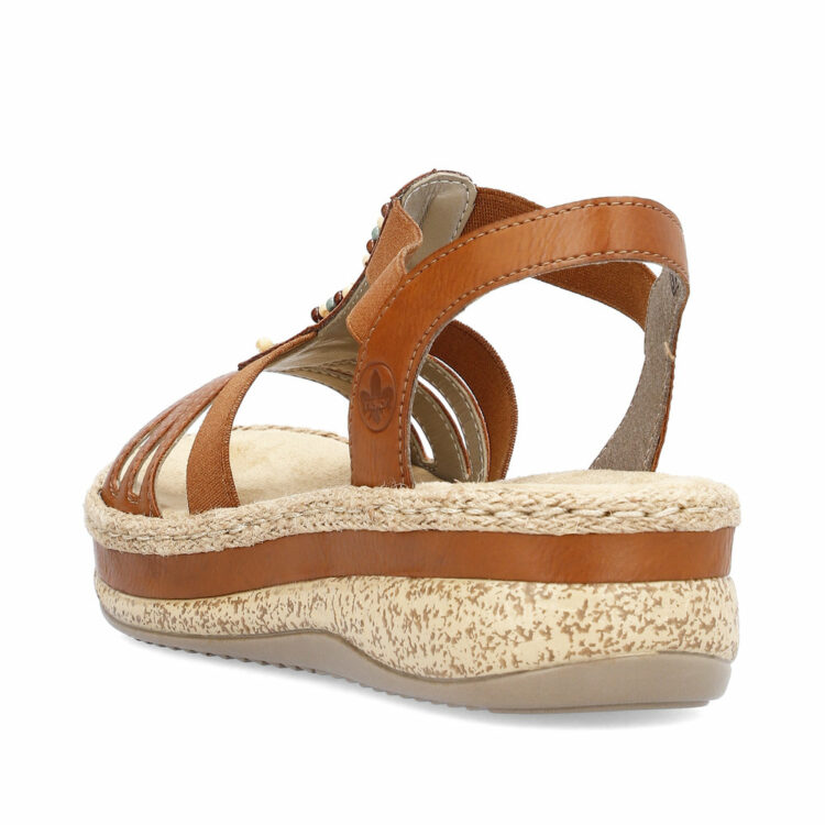 Sandales marron pour femme de la marque Rieker. Référence : V0921-24 Cayenne. Disponible chez Chauss'Family magasin de chaussures à Issoire.