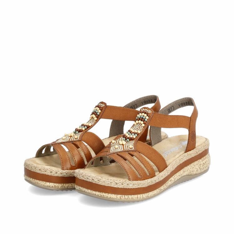 Sandales marron pour femme de la marque Rieker. Référence : V0921-24 Cayenne. Disponible chez Chauss'Family magasin de chaussures à Issoire.