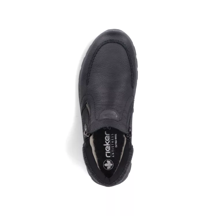 Bottillons noirs fermeture éclair de la marque Rieker. Référence : 03660-00 noir. Disponible chez Chauss'Family magasin de chaussures à Issoire.