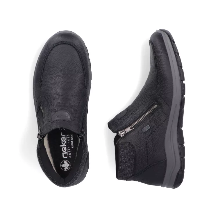 Bottillons noirs fermeture éclair de la marque Rieker. Référence : 03660-00 noir. Disponible chez Chauss'Family magasin de chaussures à Issoire.