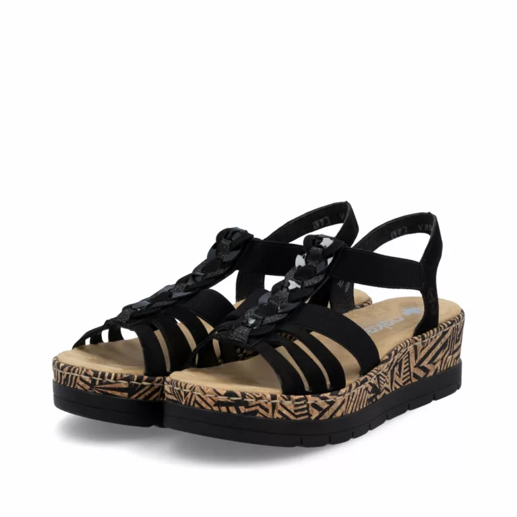 Sandales compensées noires Rieker pour femme. Référence : V3902-00 Schwarz. Disponible chez Chauss'Family magasin de chaussures à Issoire.