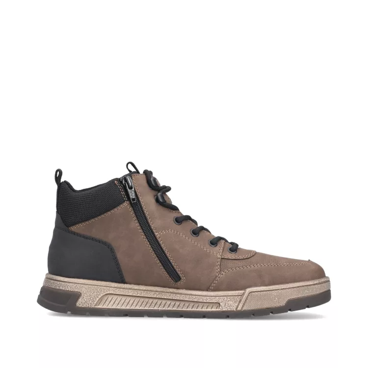 Baskets montantes chaudes marron et noir de la marque Rieker. Référence : 36020- 24 marron. Disponible chez Chauss'Family magasin de chaussures à Issoire.