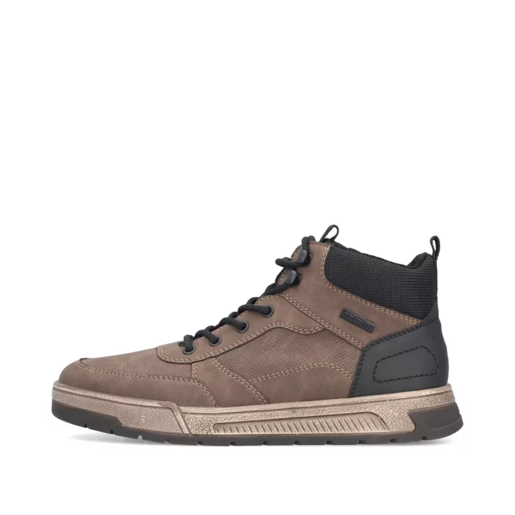 Baskets montantes chaudes marron et noir de la marque Rieker. Référence : 36020- 24 marron. Disponible chez Chauss'Family magasin de chaussures à Issoire.