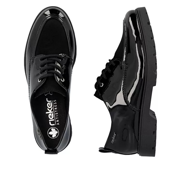 Derbies noires vernies de la marque Rieker pour femme. Référence : 45500-00 Noir. Disponible chez Chauss'Family magasin de chaussures à Issoire.