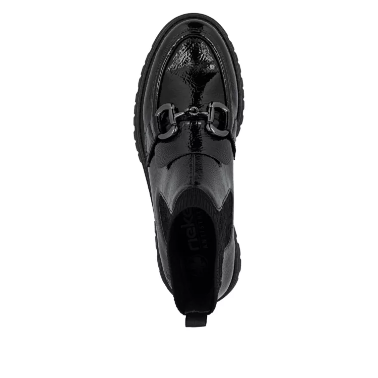 Bottines noires vernies de la marque Rieker pour femme. Référence : 47573-00 Black. Disponible chez Chauss'Family magasin de chaussures à Issoire.