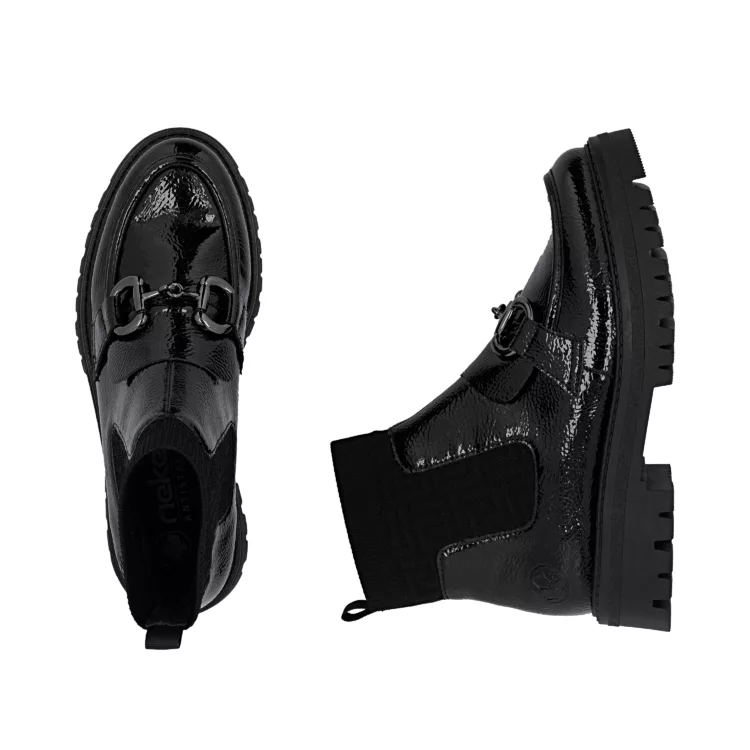 Bottines noires vernies de la marque Rieker pour femme. Référence : 47573-00 Black. Disponible chez Chauss'Family magasin de chaussures à Issoire.