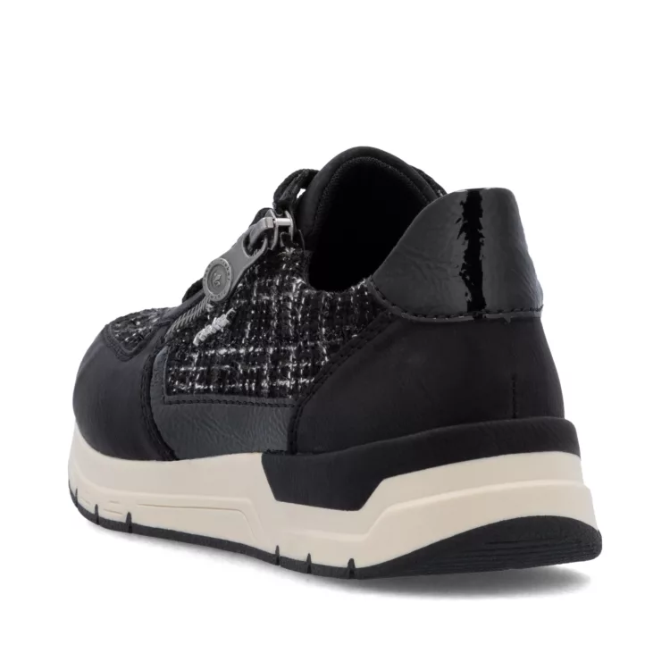 Baskets noires de la marque Rieker pour femme. Référence : 58902-01 Noir. Disponible chez Chauss'Family magasin de chaussures à Issoire.