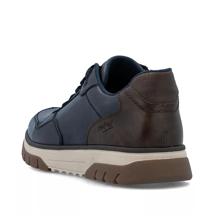 Baskets grande largeur bleues de la marque Rieker. Référence : B9301-14 Pazifik. Disponible chez Chauss'Family magasin de chaussures à Issoire.