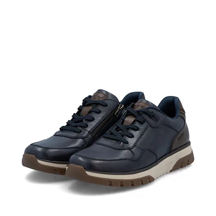Baskets grande largeur bleues de la marque Rieker. Référence : B9301-14 Pazifik. Disponible chez Chauss'Family magasin de chaussures à Issoire.