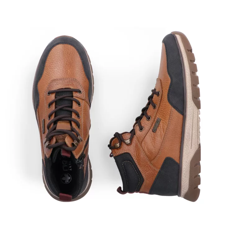 Baskets montantes chaudes de la marque Rieker. Référence : B9310-22 marron. Disponible chez Chauss'Family magasin de chaussures à Issoire.