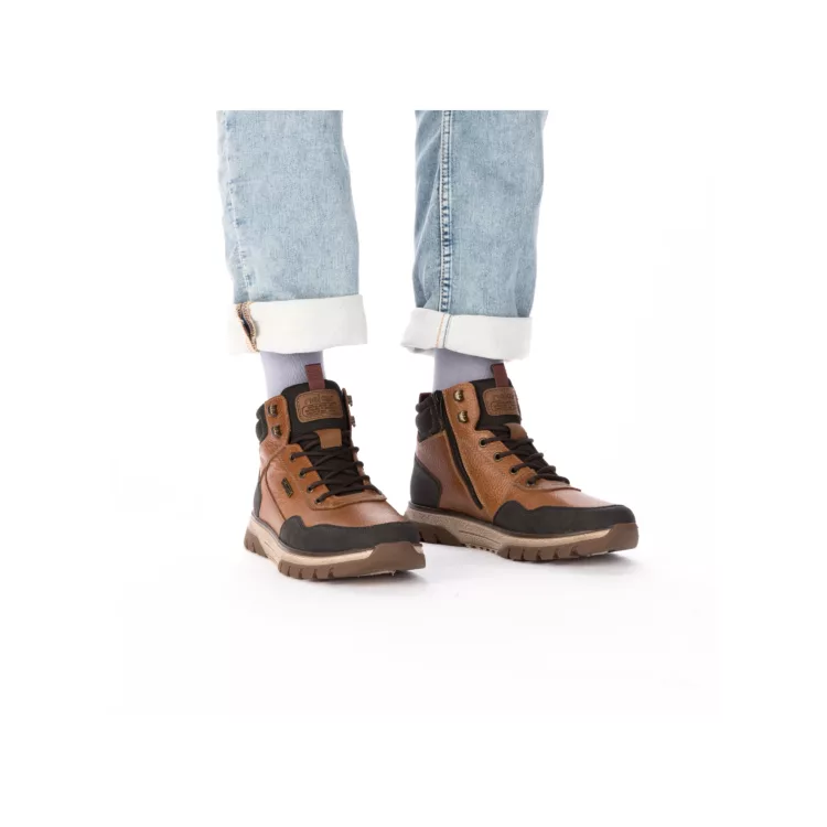 Baskets montantes chaudes de la marque Rieker. Référence : B9310-22 marron. Disponible chez Chauss'Family magasin de chaussures à Issoire.