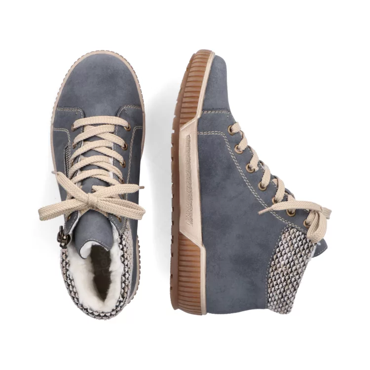 Baskets montantes bleu clair de la marque Rieker pour femme. Référence : N0709-14 Bleu. Disponible chez Chauss'Family magasin de chaussures à Issoire.