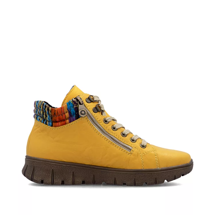 Baskets montantes jaunes de la marque Rieker. Référence : N1305-68 Jaune . Disponible chez Chauss'Family magasin de chaussures à Issoire.