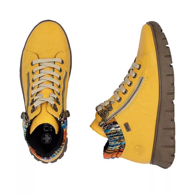 Baskets montantes jaunes de la marque Rieker. Référence : N1305-68 Jaune . Disponible chez Chauss'Family magasin de chaussures à Issoire.