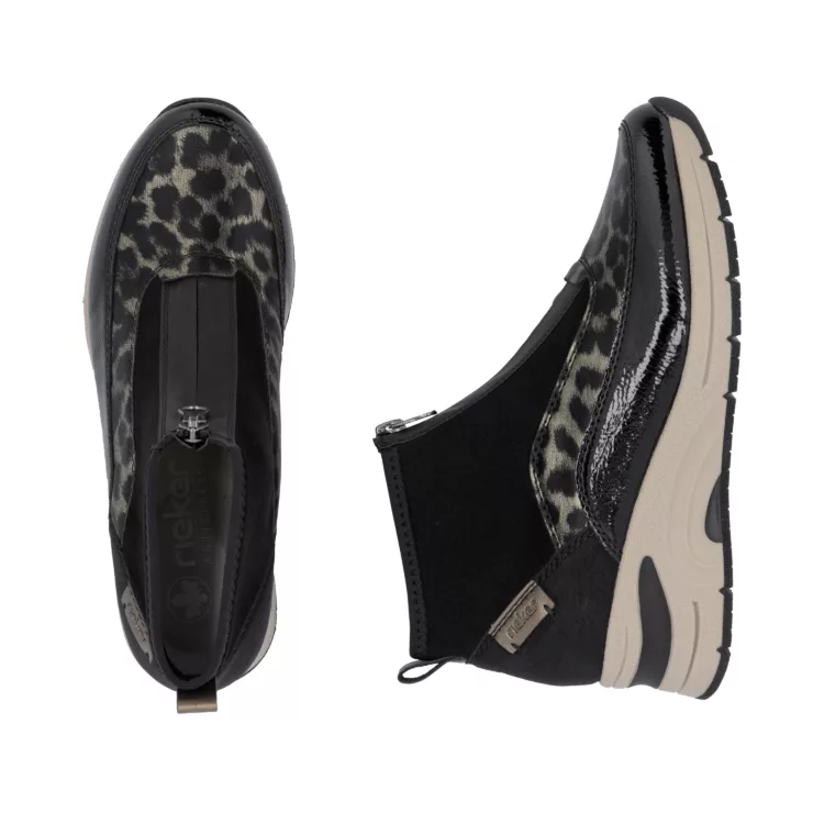 Chaussures montantes léopard de la marque Rieker. Référence : N9362-00 Noir . Disponible chez Chauss'Family magasin de chaussures à Issoire.