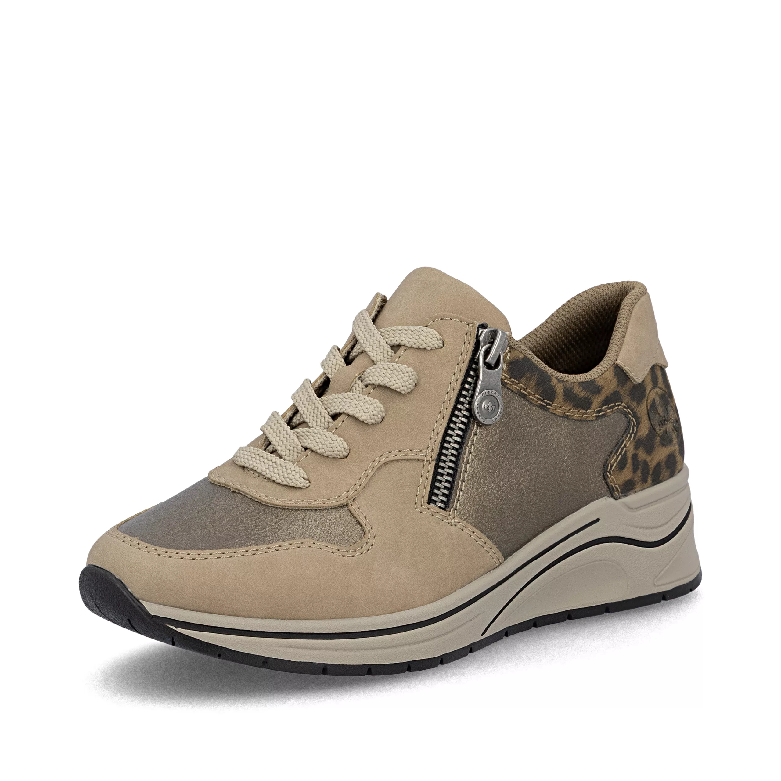 Baskets beiges compensées Rieker pour femme. Référence :N9503-20 Beige. Disponible chez Chauss'Family magasin de chaussures à Issoire.