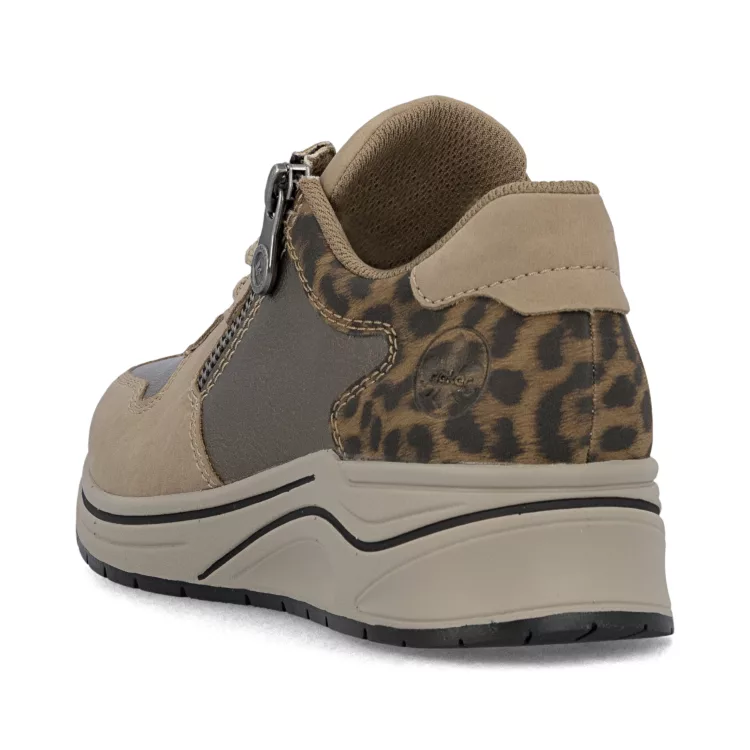 Baskets compensées léopard de la marque Rieker pour femme. Référence : N9503-20 Beige. Disponible chez Chauss'Family magasin de chaussures à Issoire.