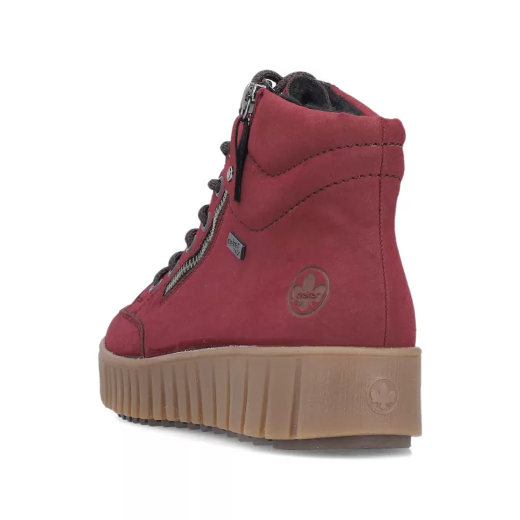 Baskets montantes chaudes pour femme marque Rieker. Référence Y6104-35 Bordeaux. Disponible chez Chauss'Family magasin de chaussures Issoire.