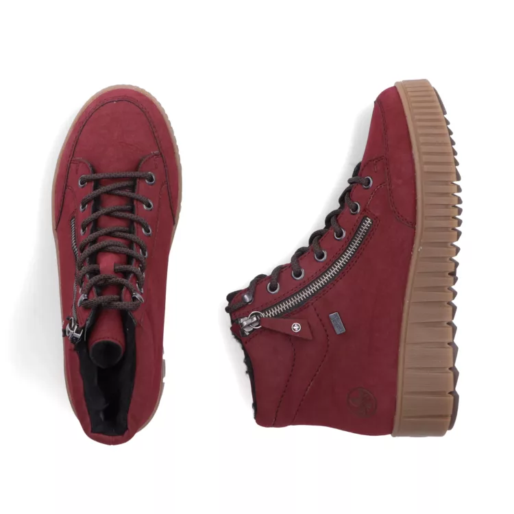 Baskets montantes chaudes pour femme marque Rieker. Référence Y6104-35 Bordeaux. Disponible chez Chauss'Family magasin de chaussures Issoire.