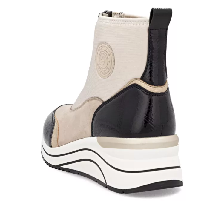 Chaussures montantes beige et noir pour femme de la marque Remonte. Référence D0T78-60 Beige Noir. Disponible chez Chauss'Family magasin chaussures Issoire.