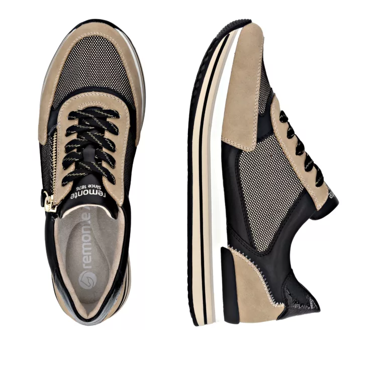Baskets beige et noire de la marque Remonte pour femme. Référence D1328-04 Beige et Noir. Disponible chez Chauss'Family magasin de chaussures à Issoire.