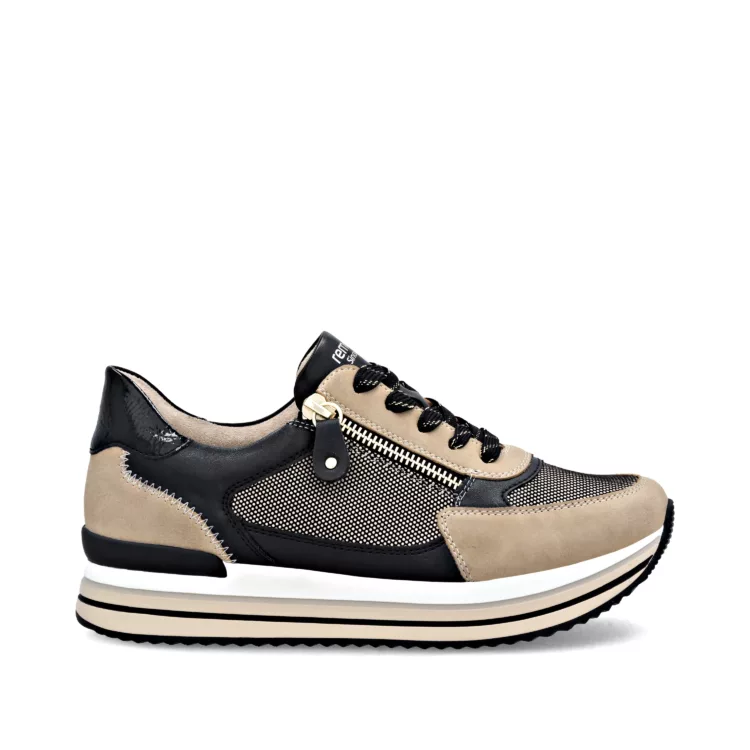 Baskets beige et noire de la marque Remonte pour femme. Référence D1328-04 Beige et Noir. Disponible chez Chauss'Family magasin de chaussures à Issoire.