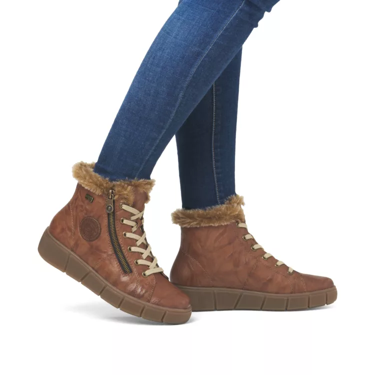 Baskets montantes marron pour femme marque Remonte. Référence D1T72-22 muskat. Disponible chez Chauss'Family magasin de chaussures Issoire