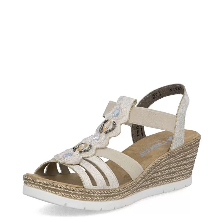 Sandales métallisées compensées Rieker pour femme . Référence : 619B2-60 Doré. Disponible chez Chauss'Family magasin de chaussures à Issoire.