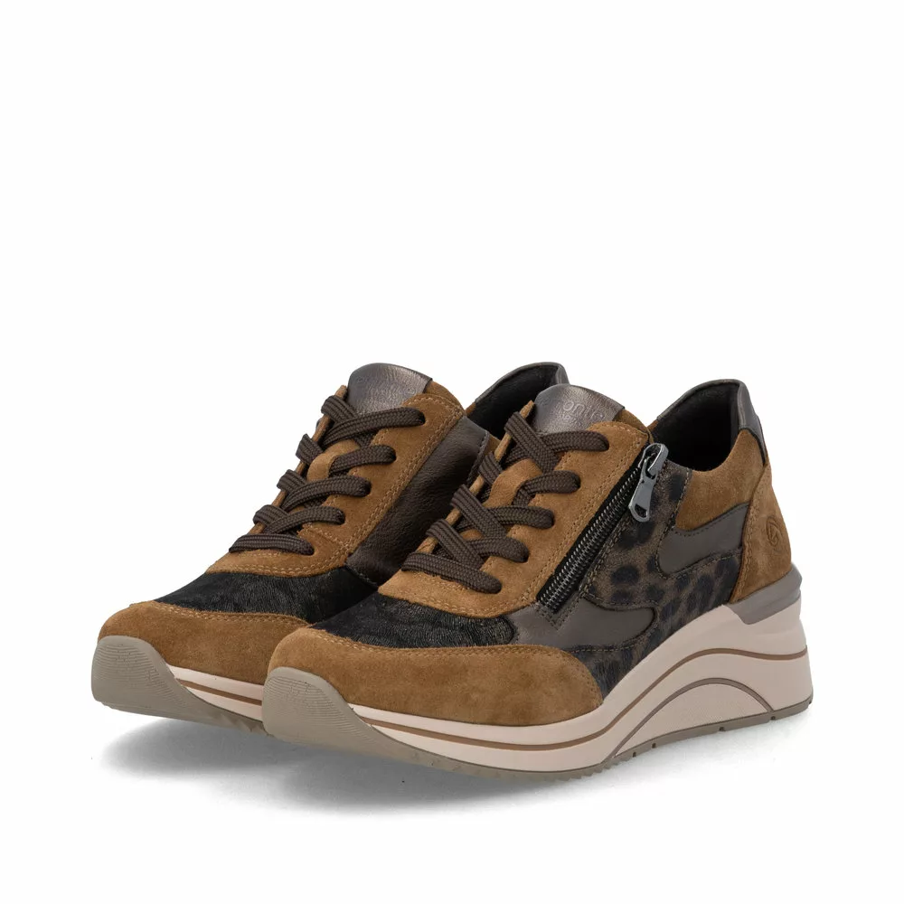 Baskets compensées marron et léopard pour femme Remonte. Référence : D0T23-24 Marron. Disponible chez Chauss'Family magasin de chaussures à Issoire.