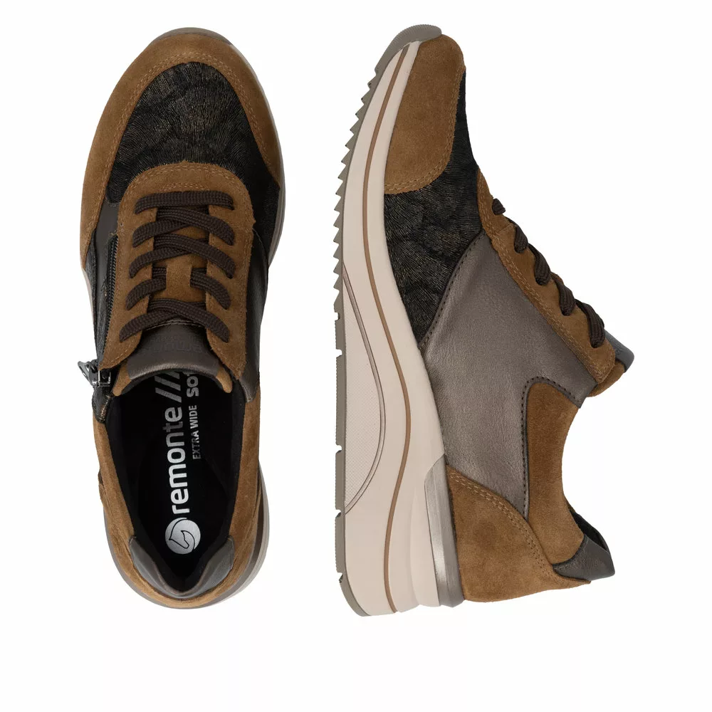 Baskets compensées marron et léopard pour femme Remonte. Référence : D0T23-24 Marron. Disponible chez Chauss'Family magasin de chaussures à Issoire.