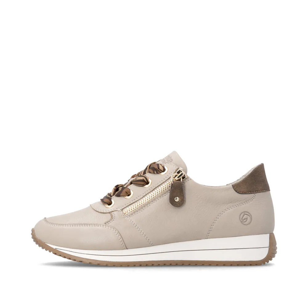 Baskets beiges pour femme Remonte. Référence :D0H11-62 Beige. Disponible chez Chauss'Family magasin de chaussures à Issoire.