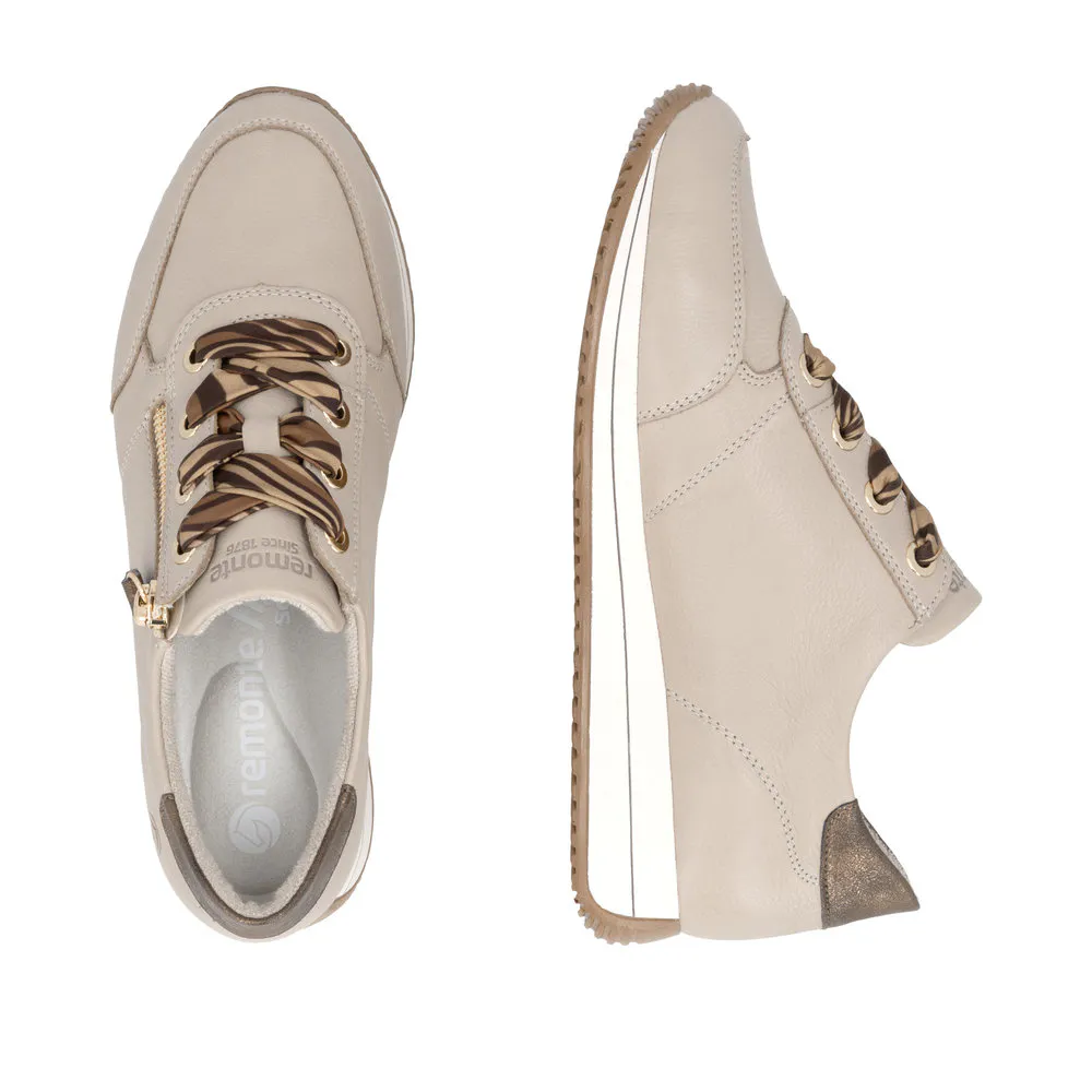 Baskets beiges pour femme Remonte. Référence :D0H11-62 Beige. Disponible chez Chauss'Family magasin de chaussures à Issoire.