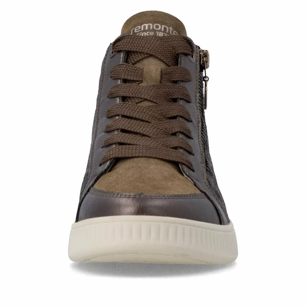 Baskets montantes léopard pour femme marque Remonte. Référence D2E70-90 Bronze . Disponible chez Chauss'Family magasin de chaussures à Issoire.