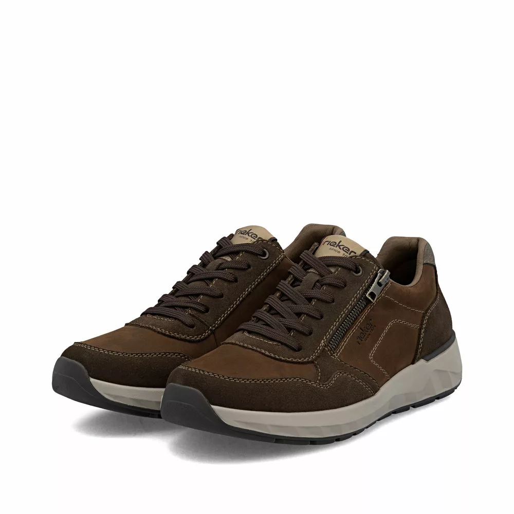 Baskets marron larges pour homme marque Rieker. Référence 11500-22 Marron. Disponible chez Chauss'Family magasin de chaussures à Issoire.