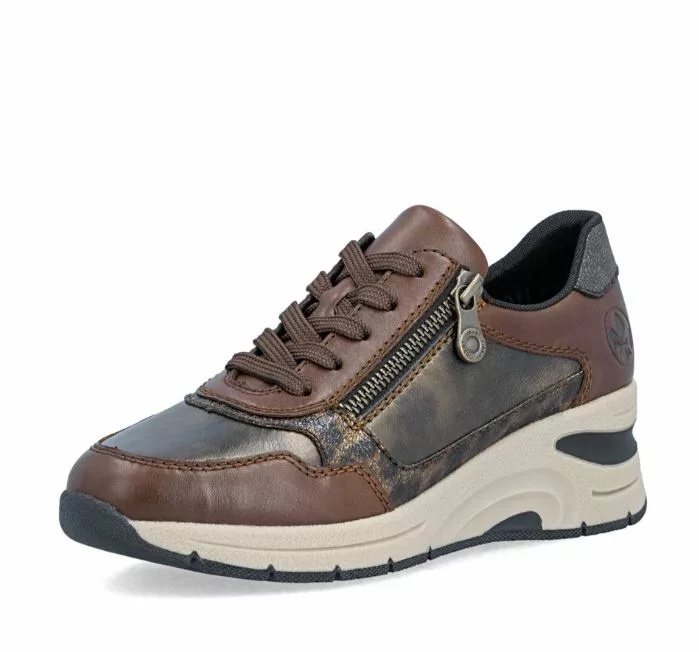 Baskets marron compensées Rieker pour femme. Référence : N9301-27 Marron . Disponible chez Chauss'Family magasin de chaussures à Issoire.