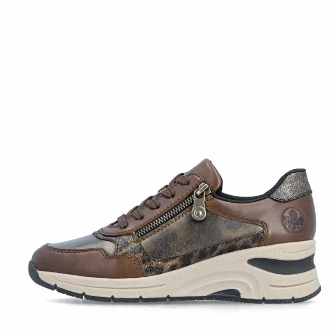 Baskets marron compensées Rieker pour femme. Référence : N9301-27 Marron . Disponible chez Chauss'Family magasin de chaussures à Issoire.