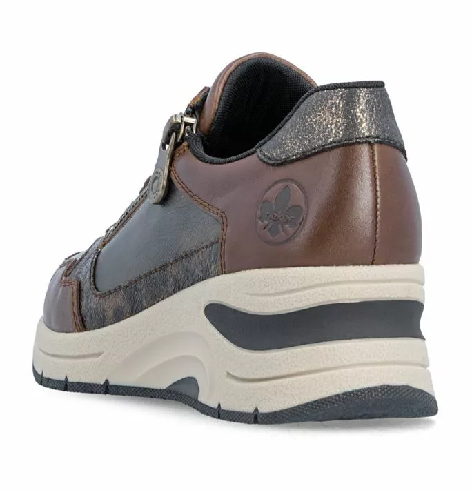 Baskets marron compensées Rieker pour femme. Référence : N9301-27 Marron . Disponible chez Chauss'Family magasin de chaussures à Issoire.
